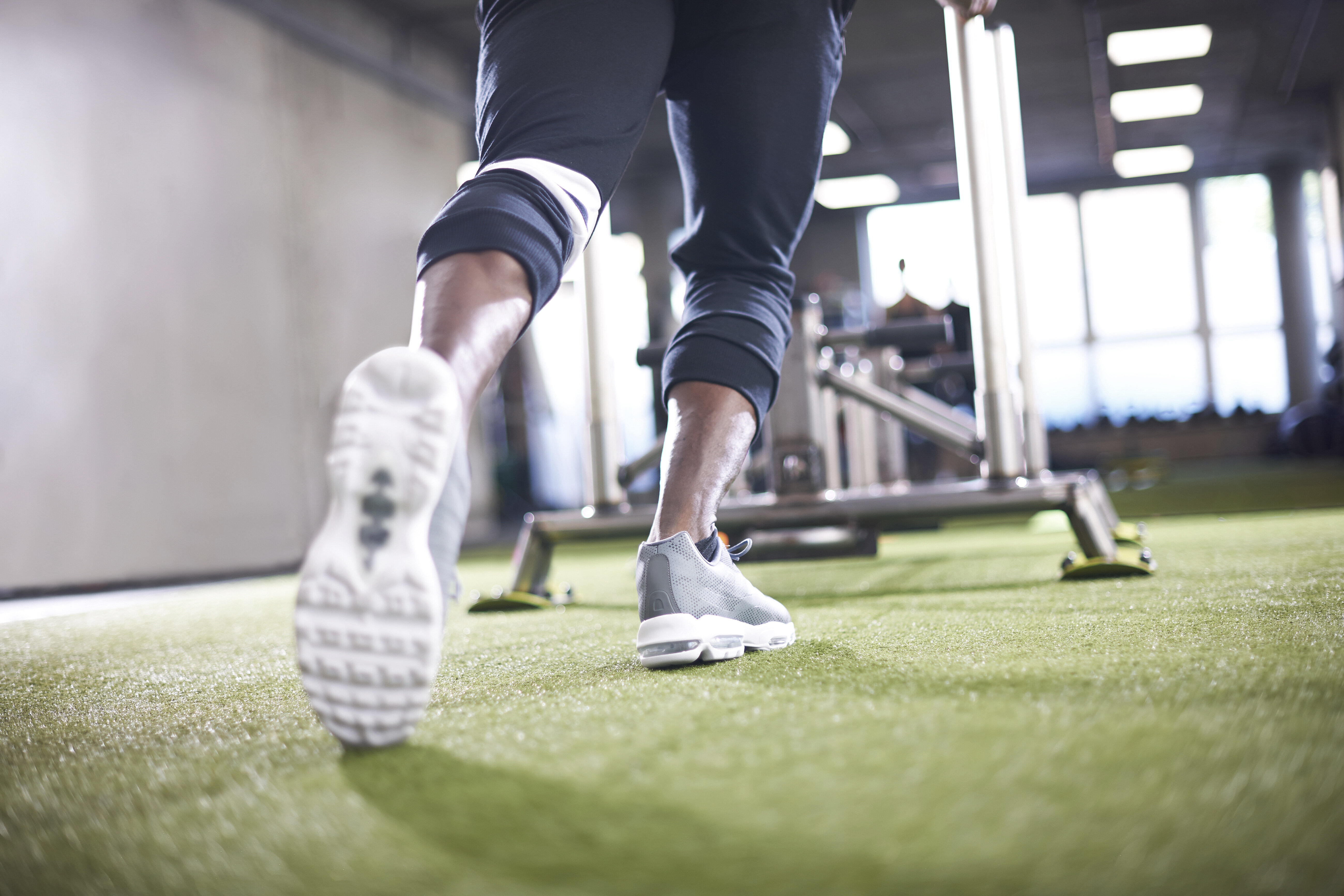 man-doing-sled-training-in-gym-2025-04-04-11-25-05-utc